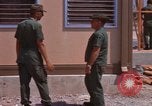 Image of dining hall under construction at U-Tapao Royal Thai Navy Airfield Thailand, 1969, second 17 stock footage video 65675034374