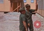 Image of dining hall under construction at U-Tapao Royal Thai Navy Airfield Thailand, 1969, second 24 stock footage video 65675034374