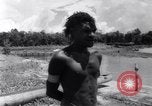 Standbild Nelson Rockefeller New Guinea, 1961, aus Sekunde 43 historischem Filmmaterial Videoclip 65675034494