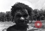 Standbild Nelson Rockefeller New Guinea, 1961, aus Sekunde 47 historischem Filmmaterial Videoclip 65675034494