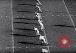 Standbild Ohio State gegen University of Michigan College Football Ann Arbor Michigan USA, 1961, aus Sekunde 31 historischem Filmmaterial Videoclip 65675034497