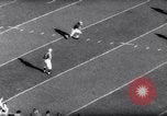 Standbild Ohio State gegen University of Michigan College Football Ann Arbor Michigan USA, 1961, aus Sekunde 36 historischem Filmmaterial Videoclip 65675034497