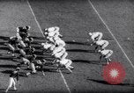 Standbild Ohio State gegen University of Michigan College Football Ann Arbor Michigan USA, 1961, aus Sekunde 58 historischem Filmmaterial Videoclip 65675034497
