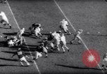 Standbild Ohio State gegen University of Michigan College Football Ann Arbor Michigan USA, 1961, aus Sekunde 60 historischem Filmmaterial Videoclip 65675034497