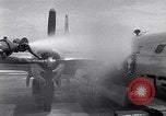 Image of washing B-29  Marshall Islands, 1946, second 28 stock footage video 65675034522