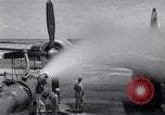 Image of washing B-29  Marshall Islands, 1946, second 52 stock footage video 65675034522