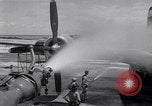 Image of washing B-29  Marshall Islands, 1946, second 57 stock footage video 65675034522