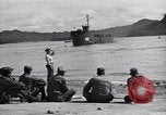 Image of landing barges Sasebo Japan, 1945, second 24 stock footage video 65675034556