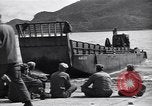 Image of landing barges Sasebo Japan, 1945, second 30 stock footage video 65675034556