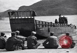 Image of landing barges Sasebo Japan, 1945, second 31 stock footage video 65675034556