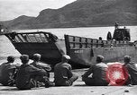 Image of landing barges Sasebo Japan, 1945, second 34 stock footage video 65675034556