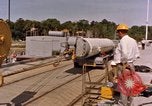 Image of loading dockside to submarine United States USA, 1964, second 4 stock footage video 65675034571