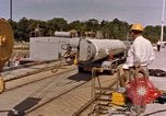 Image of loading dockside to submarine United States USA, 1964, second 5 stock footage video 65675034571