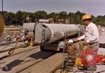 Image of loading dockside to submarine United States USA, 1964, second 9 stock footage video 65675034571