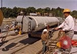 Image of loading dockside to submarine United States USA, 1964, second 10 stock footage video 65675034571