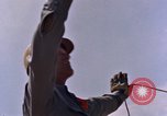 Image of loading dockside to submarine United States USA, 1964, second 13 stock footage video 65675034571