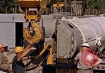 Image of loading dockside to submarine United States USA, 1964, second 14 stock footage video 65675034571