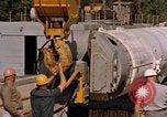 Image of loading dockside to submarine United States USA, 1964, second 16 stock footage video 65675034571