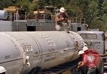Image of loading dockside to submarine United States USA, 1964, second 25 stock footage video 65675034571