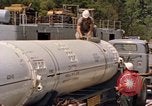 Image of loading dockside to submarine United States USA, 1964, second 28 stock footage video 65675034571
