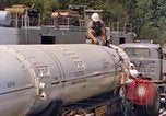 Image of loading dockside to submarine United States USA, 1964, second 31 stock footage video 65675034571