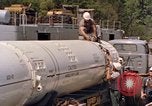 Image of loading dockside to submarine United States USA, 1964, second 32 stock footage video 65675034571