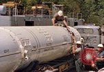 Image of loading dockside to submarine United States USA, 1964, second 33 stock footage video 65675034571