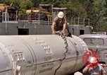 Image of loading dockside to submarine United States USA, 1964, second 37 stock footage video 65675034571
