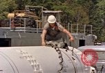 Image of loading dockside to submarine United States USA, 1964, second 38 stock footage video 65675034571