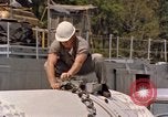 Image of loading dockside to submarine United States USA, 1964, second 40 stock footage video 65675034571
