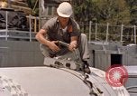 Image of loading dockside to submarine United States USA, 1964, second 42 stock footage video 65675034571