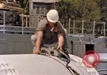 Image of loading dockside to submarine United States USA, 1964, second 43 stock footage video 65675034571