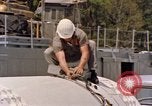 Image of loading dockside to submarine United States USA, 1964, second 45 stock footage video 65675034571