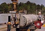 Image of loading dockside to submarine United States USA, 1964, second 53 stock footage video 65675034571