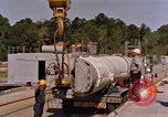 Image of loading dockside to submarine United States USA, 1964, second 56 stock footage video 65675034571