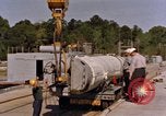 Image of loading dockside to submarine United States USA, 1964, second 57 stock footage video 65675034571