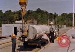 Image of loading dockside to submarine United States USA, 1964, second 59 stock footage video 65675034571