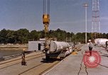 Image of loading dockside to submarine United States USA, 1964, second 62 stock footage video 65675034571