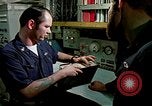 Image of US Navy sailors perform duties aboard submarine at sea United States USA, 1970, second 43 stock footage video 65675034575