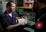 Image of US Navy sailors perform duties aboard submarine at sea United States USA, 1970, second 44 stock footage video 65675034575