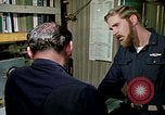 Image of US Navy sailors perform duties aboard submarine at sea United States USA, 1970, second 46 stock footage video 65675034575