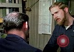 Image of US Navy sailors perform duties aboard submarine at sea United States USA, 1970, second 47 stock footage video 65675034575