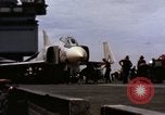 Image of U.S. Aircraft Carrier, USS Enterprise launching aircraft Gulf of Tonkin, 1966, second 10 stock footage video 65675034591