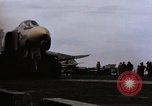 Image of U.S. Aircraft Carrier, USS Enterprise launching aircraft Gulf of Tonkin, 1966, second 11 stock footage video 65675034591