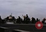 Image of U.S. Aircraft Carrier, USS Enterprise launching aircraft Gulf of Tonkin, 1966, second 30 stock footage video 65675034591