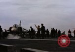 Image of U.S. Aircraft Carrier, USS Enterprise launching aircraft Gulf of Tonkin, 1966, second 31 stock footage video 65675034591
