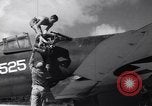 Image of Pilot and plane captain of F4U perform engine start Espiritu Santo New Hebrides Islands, 1944, second 8 stock footage video 65675034616