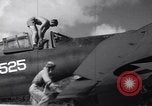 Image of Pilot and plane captain of F4U perform engine start Espiritu Santo New Hebrides Islands, 1944, second 11 stock footage video 65675034616