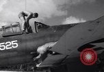 Image of Pilot and plane captain of F4U perform engine start Espiritu Santo New Hebrides Islands, 1944, second 12 stock footage video 65675034616