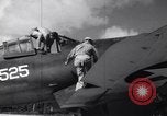 Image of Pilot and plane captain of F4U perform engine start Espiritu Santo New Hebrides Islands, 1944, second 13 stock footage video 65675034616